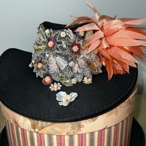 Chic Black Hat with Orange and Gold Accents